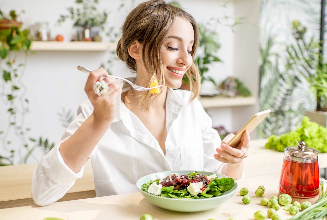 Woman enjoying healthy salad